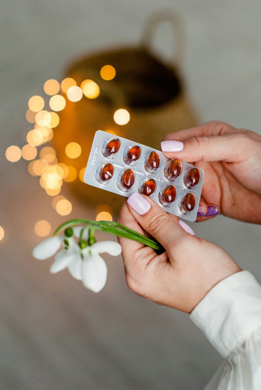 pills plants held by a hand